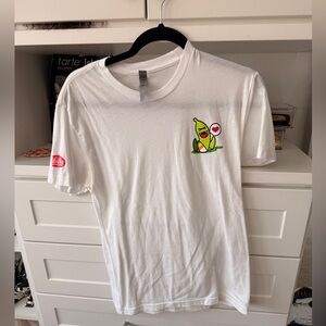 White T-Shirt with Green Graphic